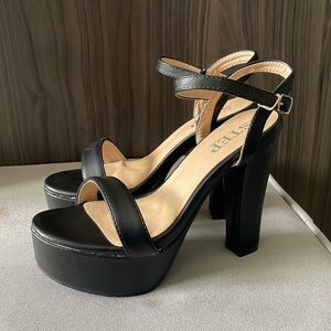 Black heels by step in size 6